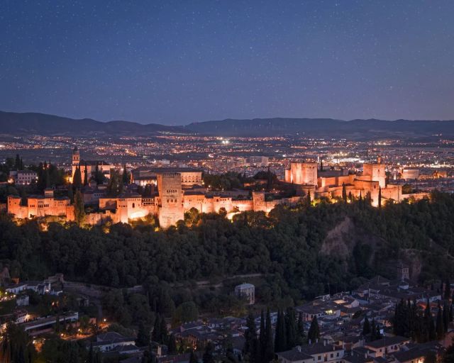 ⚜️ ENG
A night in front of the Alhambra under the stars and the moonlight is not just another night. It is a divine gift. Seize it. 🕌🎇  👉🏼 And you, where do you plan to spend the most magical summer night? ⭐️🌙⭐️🌙  ⠀
⚜️ ESP
Una noche frente a la Alhambra bajo la luz de la luna y las estrellas no es una noche más. Es un regalo divino. Aprovéchalo. 🕌🎇  👉🏼 Y tú, ¿dónde tienes planeado pasar la noche de verano más mágica? ⭐️🌙⭐️🌙  #Granada #Alhambra #Spain
#unesco #architecture #islamicarchitecture
#beautifuldestinations #forbestravelguide
#passionpassport #travelandleisure
#cntraveler #suitcasetravels
#perfect_worldplaces #world_besttravel
#travelcaptures #slowtravel
#streetphotography #visitgranada #tourguide
#granadawanderer #sunset #summernights